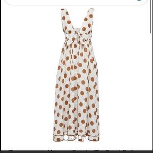 Timeless linen midi dress with a chic polka dot motif